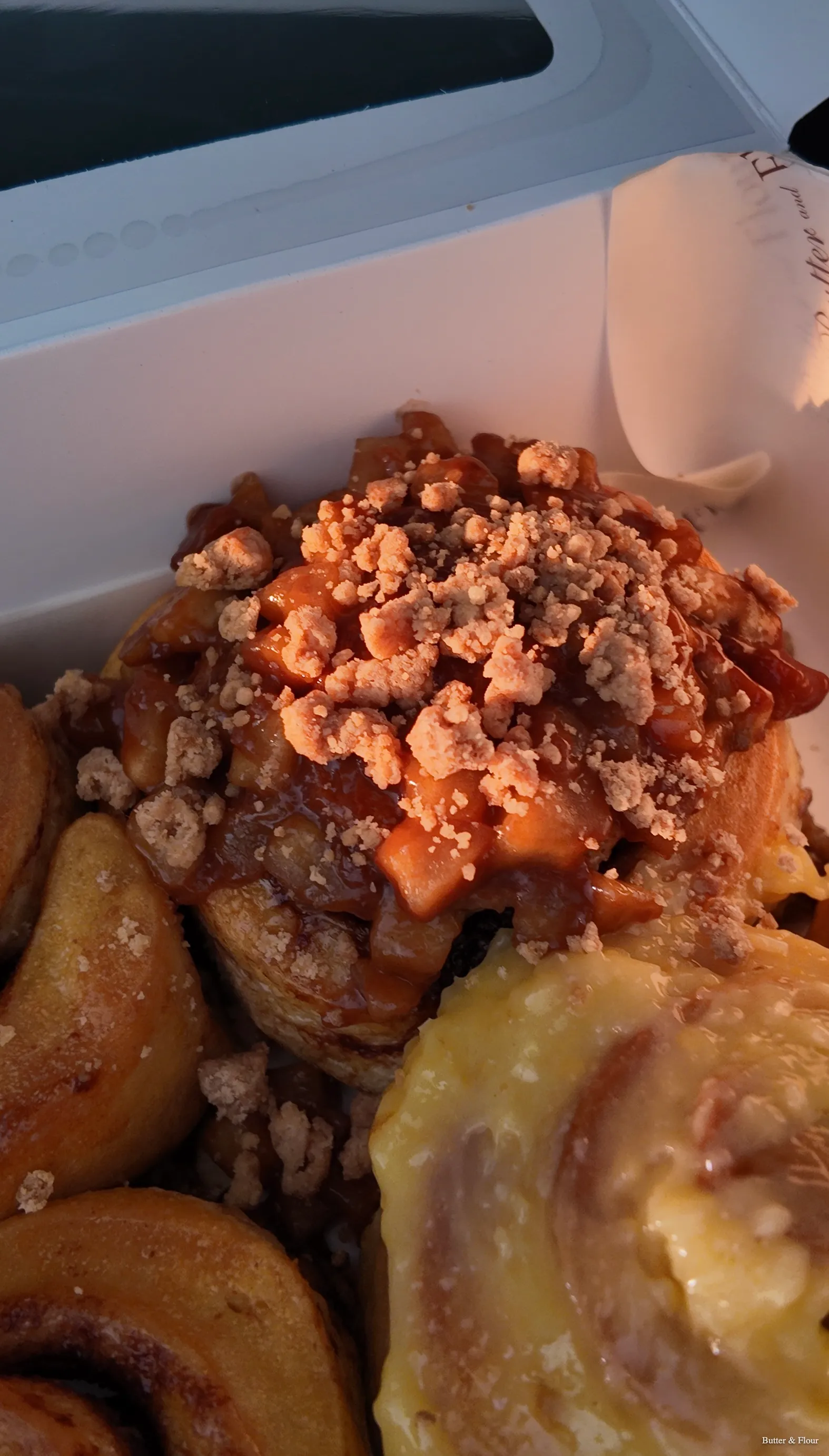 Apple cinnamon roll close-up warm tones